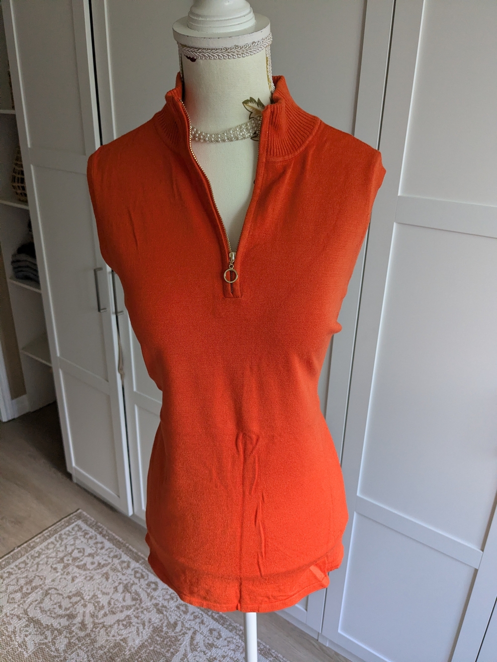 Le Château Sleeveless Zip-Neck Knit Top in Vibrant Orange